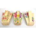 Six Arthur Wood wall pockets, each decorated with stylised flowers, max l. 22.5 cm (6)