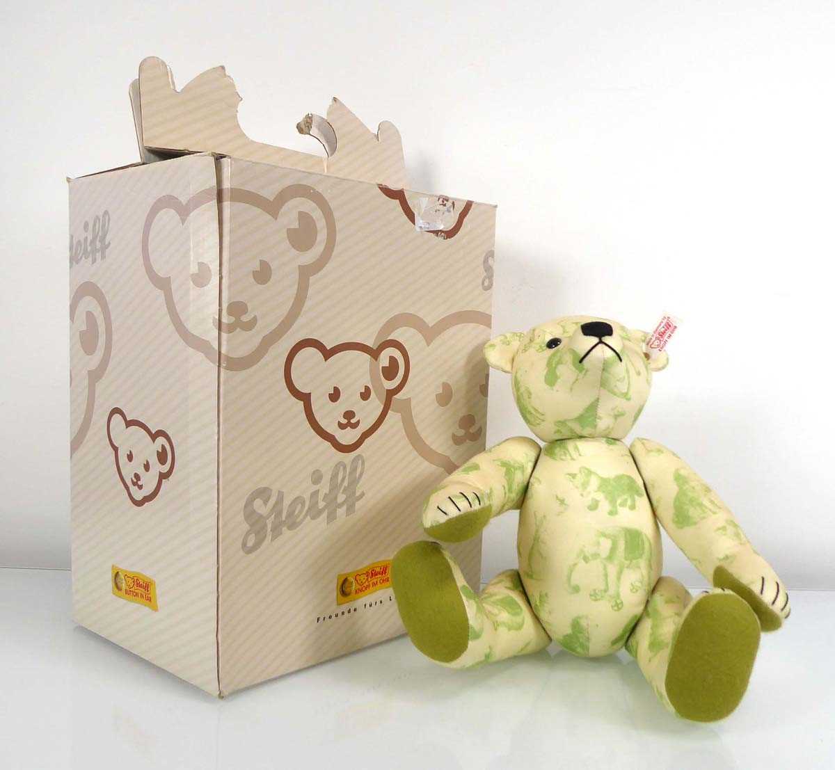 A limited edition fully jointed Steiff bear in pale green printed fabric, boxed