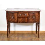 A small George III mahogany bow-fronted sideboard on turned legs, w. 107 cm