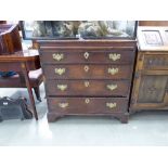 A George III mahogany bachelor's chest, the slide over four long graduated drawers, on bracket feet,