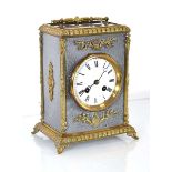 A late 19th century mantle clock, the movement striking on a bell, the gilt metal mounted case