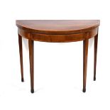 A George III walnut, strung and rosewood crossbanded card table on slender tapering legs with
