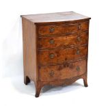 A small 18th century style walnut and crossbanded chest, bow-fronted with four graduated drawers, on