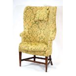 A porter's armchair with pale green and gold upholstery and a mahogany frame, h. 127 cm