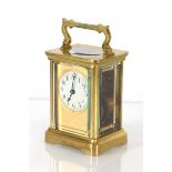 An early 20th century French carriage clock by Duverdrey & Bloquel with a brass and five-glass case,