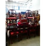 A set of eight 18th century style mahogany dining chairs with wheatsheaf backs, including two
