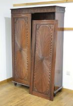 A 19th century and later Anglo-Indian rosewood cupboard, the two doors with decorative mouldings