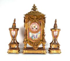 A 19th century French clock and garniture set by Henry Marc of Paris, circa 1890's, the gilt metal