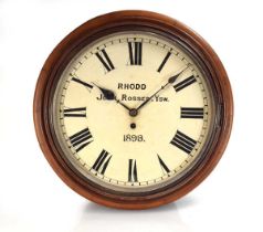 A late 19th century wall clock, the painted face with Roman numerals and signed 'Rhodd [gift] John