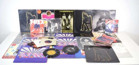 A group of T. Rex (Tyrannosaurus Rex) LPs and singles including 'Electric Warrior', 'T Rex Tanx', '