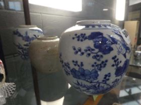 Two blue and white ginger jars and a stoneware example, max h. 13 cm (3) Cracks and nibbles.