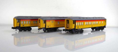 Three plastic Lionel O gauge coaches (3)