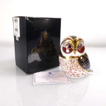 A Royal Crown Derby paperweight modelled as a tawny owl, h. 9 cm, boxed and with certificate