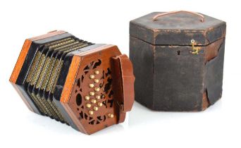 A 19th century twenty seven button walnut concertina in a leather-bound carrying case Ivory