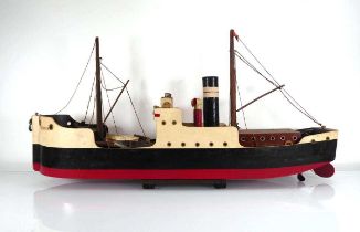 A Tri-ang wooden steamer, l. 76 cm Has a key but we do not believe it to be of working order. See