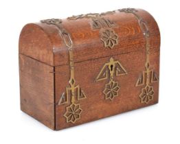 A Victorian oak and brass bound stationary box of dome-topped form, 22 x 12 cm