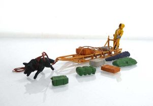 A Herald plastic sled team (incomplete) Incomplete