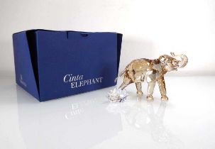 A Swarovski Crystal Society figure modelled as Cinta the Elephant, h. 10 cm, with plaque, boxed