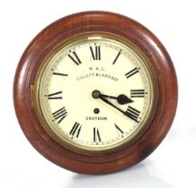 An early 20th century wall clock with a single fusee movement, the enamelled dial labelled 'M.R.C.