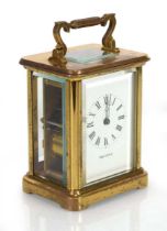 A 20th century English carriage clock, the enamelled face with Roman numerals and labelled for