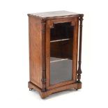 A late Victorian figured walnut and marquetry music cabinet, the glazed door enclosing two shelves