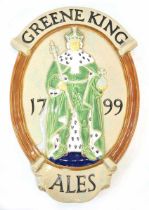 A Greene King 'Ales' ceramic wall plaque, 60 x 38 cm *Originally designed in 1933 by George Kruger