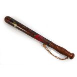 An early 20th century police truncheon, the polychrome shaft stamped '123' and '2nd 87', l. 39.5 cm