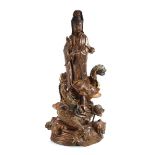 A carved wooden and polychrome figure modelled as Quan Yin, h. 68 cm