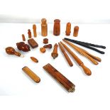 A group of treen collectables including a coquilla nut nutmeg grater, string holder, thermometer