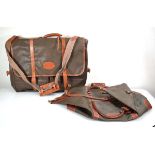 A Mulberry suit bag in scotchgrain olive and brown, serial 072719, together with a matching Mulberry