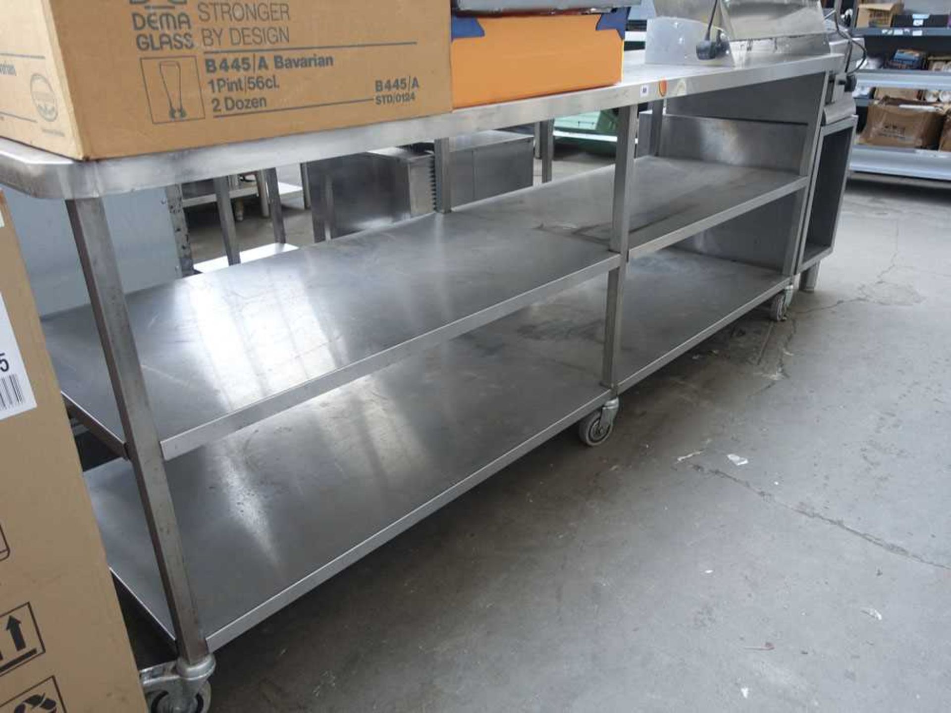 240cm stainless steel preparation table on castors with shelves under