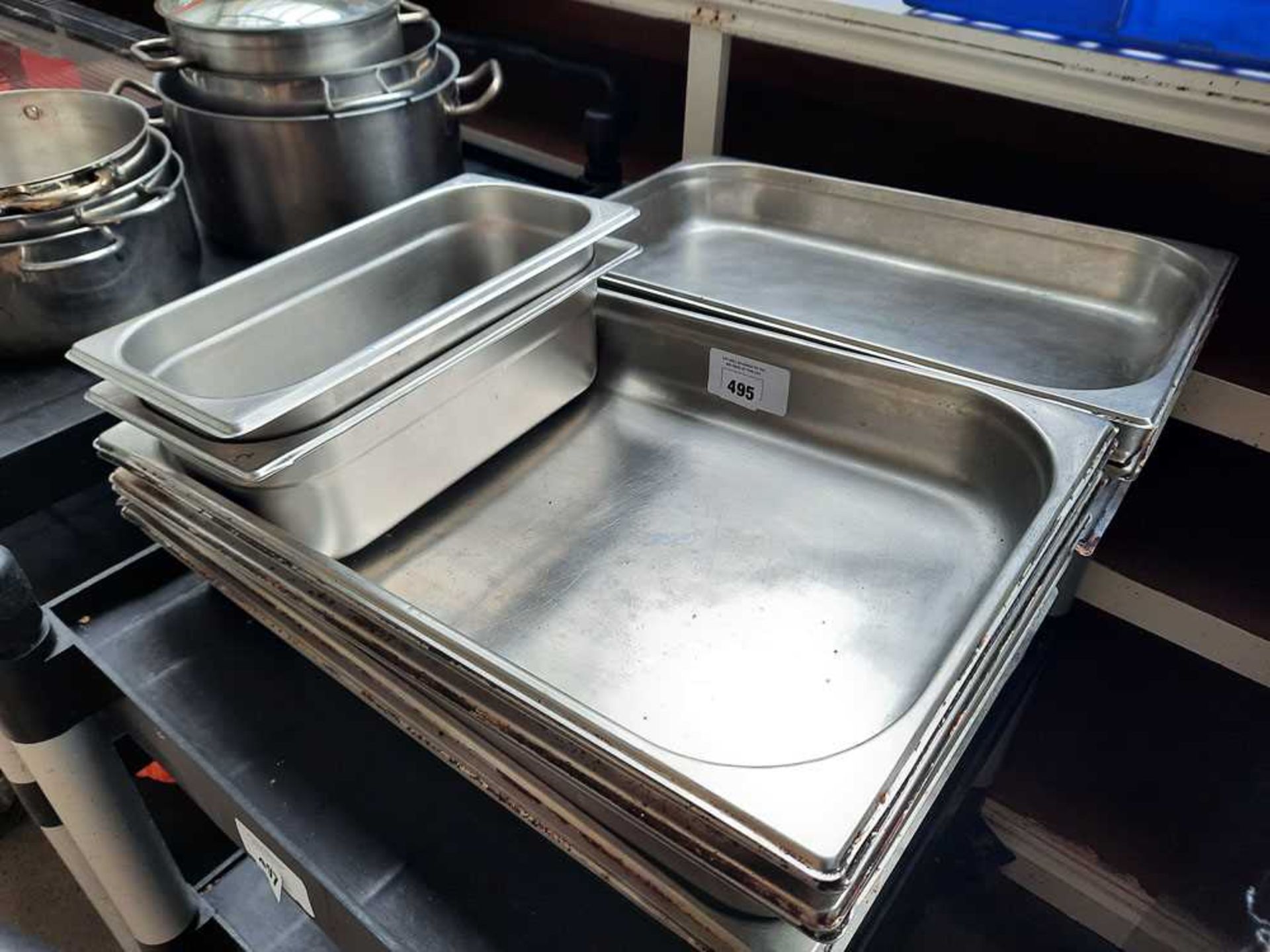 +VAT Ten stainless steel gastronorm containers, plus two smaller