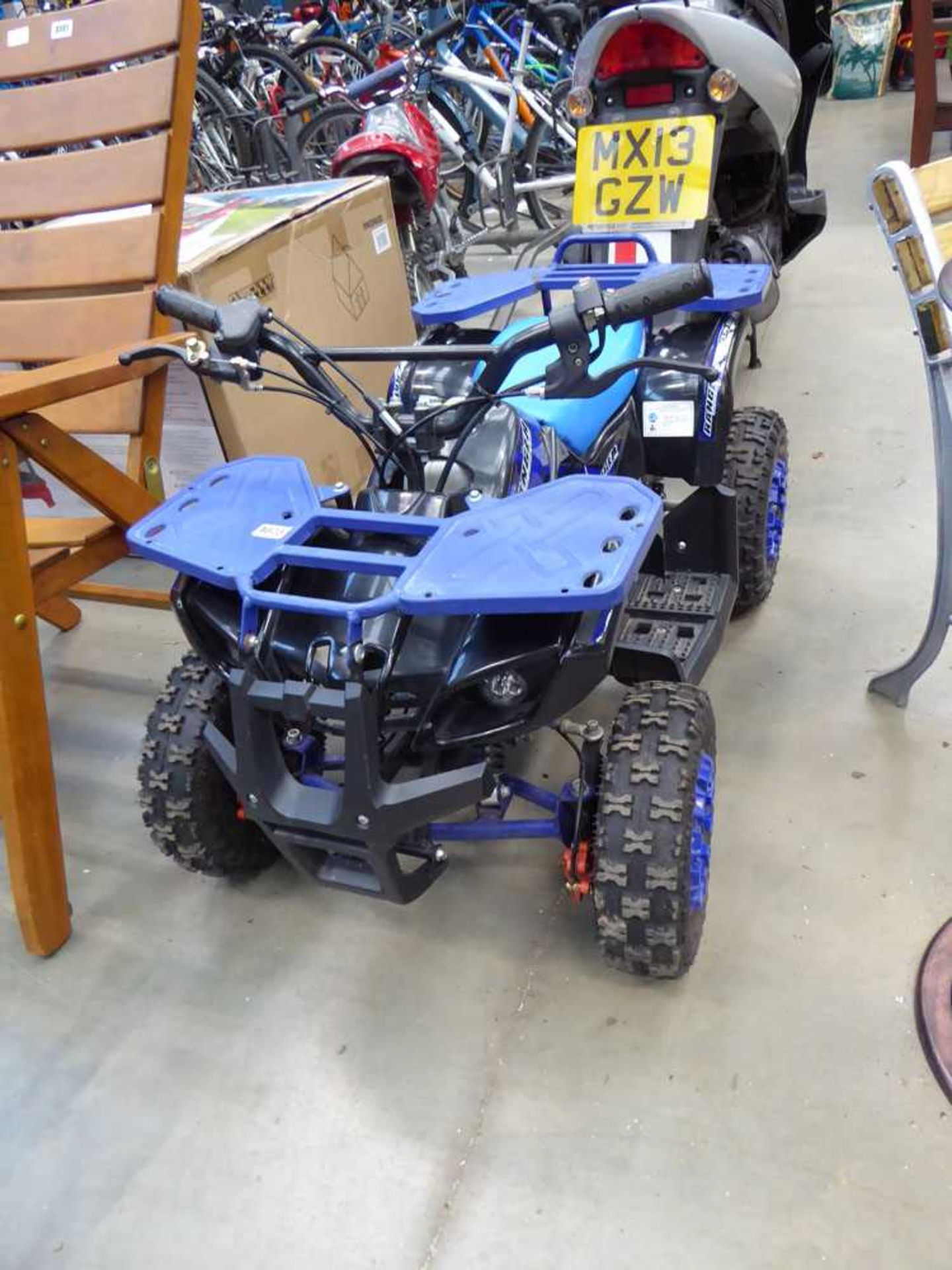 Blue and black Ranger Junior Pro petrol powered quadbike