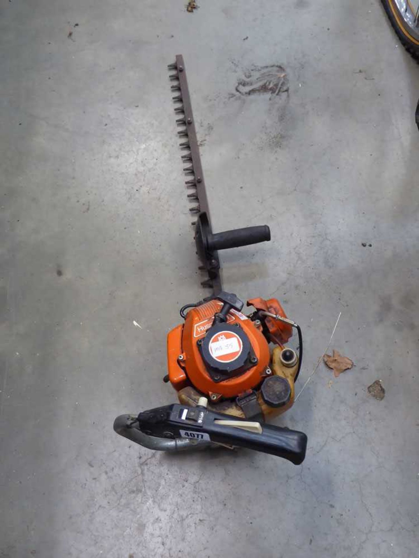 Husqvarna orange petrol powered hedgecutter