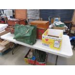 Large quantity of fishing tackle to include a box seat, floats, reels, fly tying kit and keep net