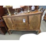 Walnut sideboard with three central drawers and cupboards to the side