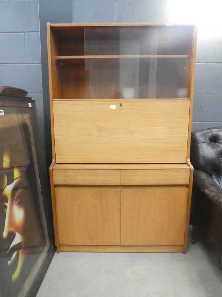 Teak fall front bureau with glazed bookcase over and cupboard under