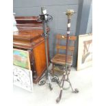 2 painted wrought iron candlesticks