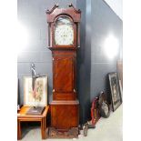A 19th century longcase clock, the movement striking on a bell, the painted face with Roman