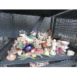 Cage containing ornamental figures, cups and saucers and china vases