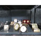 Cage containing quartz and other clocks