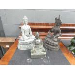 3 metal Buddhas