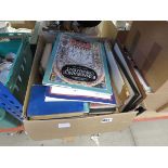 Box containing novels and reference books