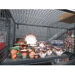 Cage containing miniature toby jugs plus floral patterned Royal Albert crockery