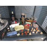 Cage containing Wade Whimsies, beer stein, miniature bottles, coasters and glassware