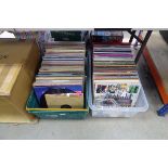 2 boxes containing vinyl records