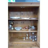 3 shelves with a quantity of floral plates, basket, brass oil lamp, hat brush, postal scales,