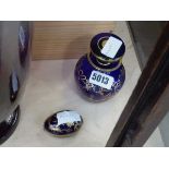 Blue and gilt glass scent bottle and an egg shaped lamoges pill box