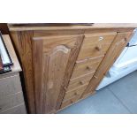 Pine storage cabinet with five central drawers