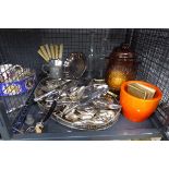 Cage containing loose cutlery, galleried serving tray, glass bottles and a biscuit barrel